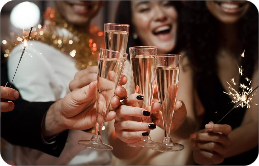 people-cheering-new-year-s-eve-party@2x